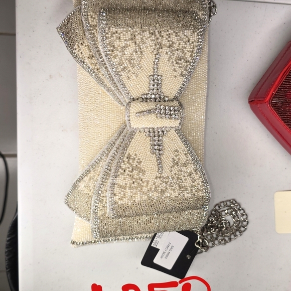 Mary Frances Cream and Silver Bow Clutch